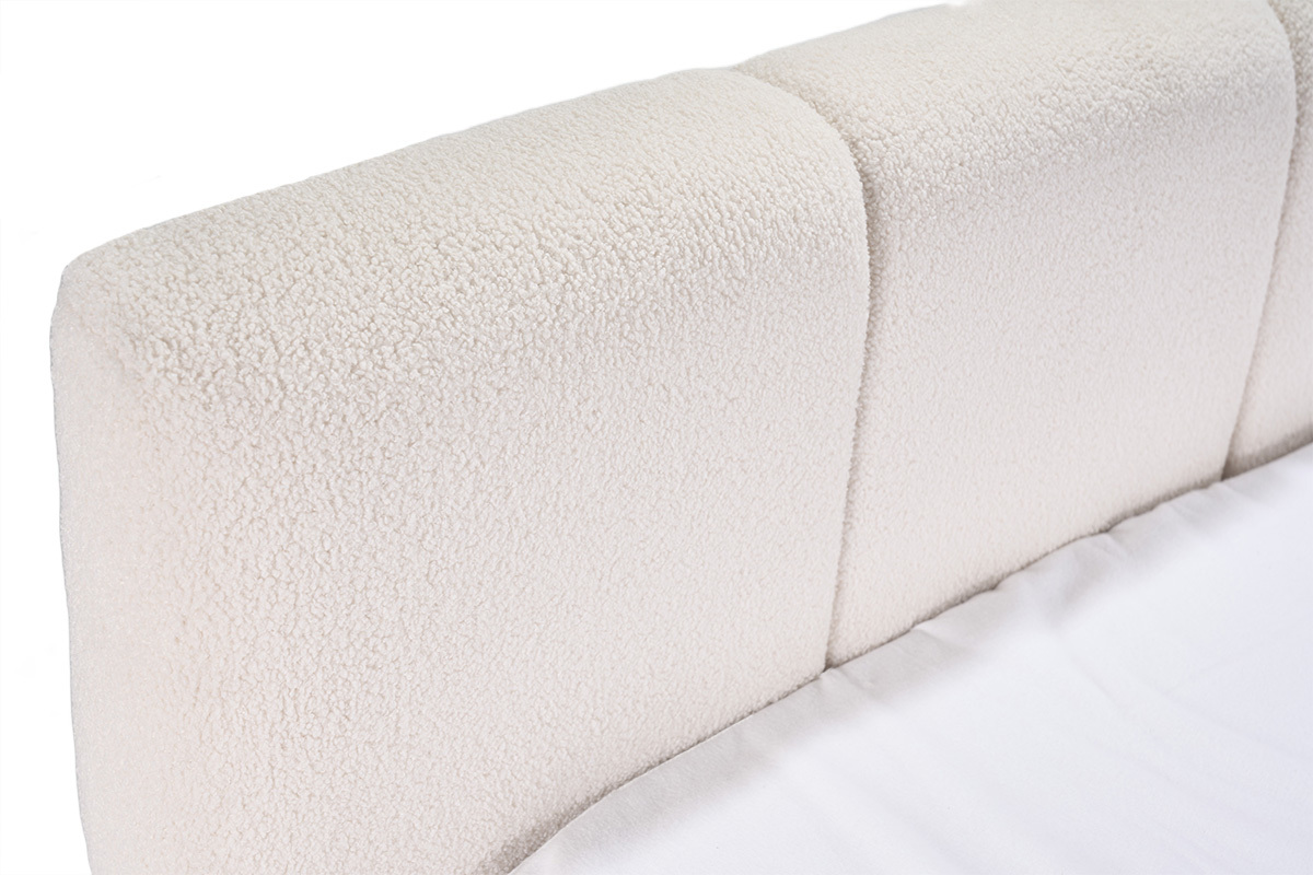 T�te de lit coffre en tissu laine boucl�e, vue de proche.